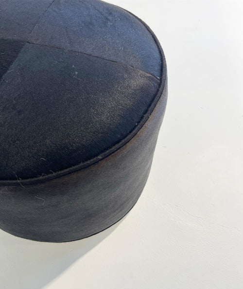 The Forsyth Pouf Ottoman in Black Cowhide 01