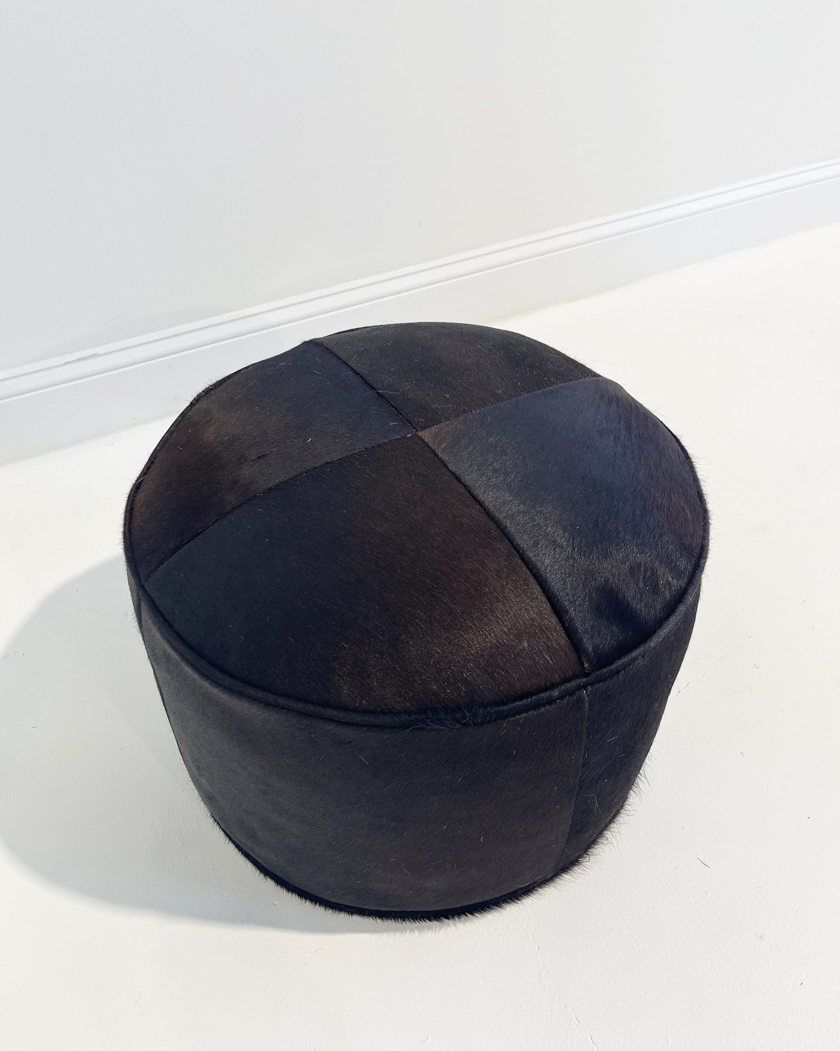 The Forsyth Pouf Ottoman in Black Cowhide 02