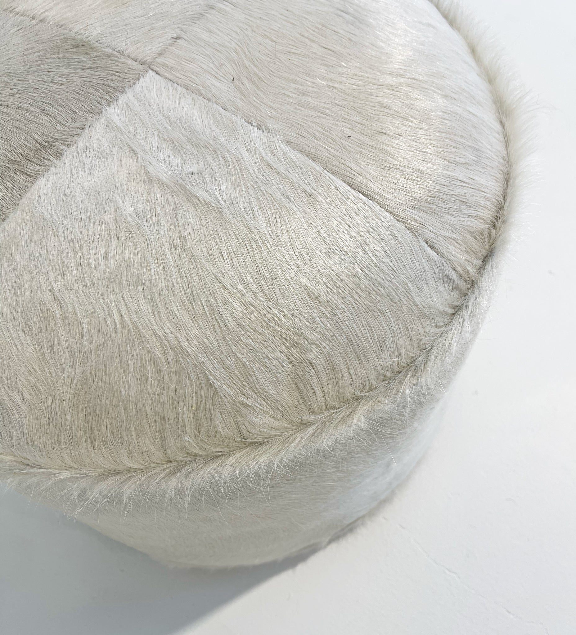 The Forsyth Pouf Ottoman in Ivory Cowhide 02