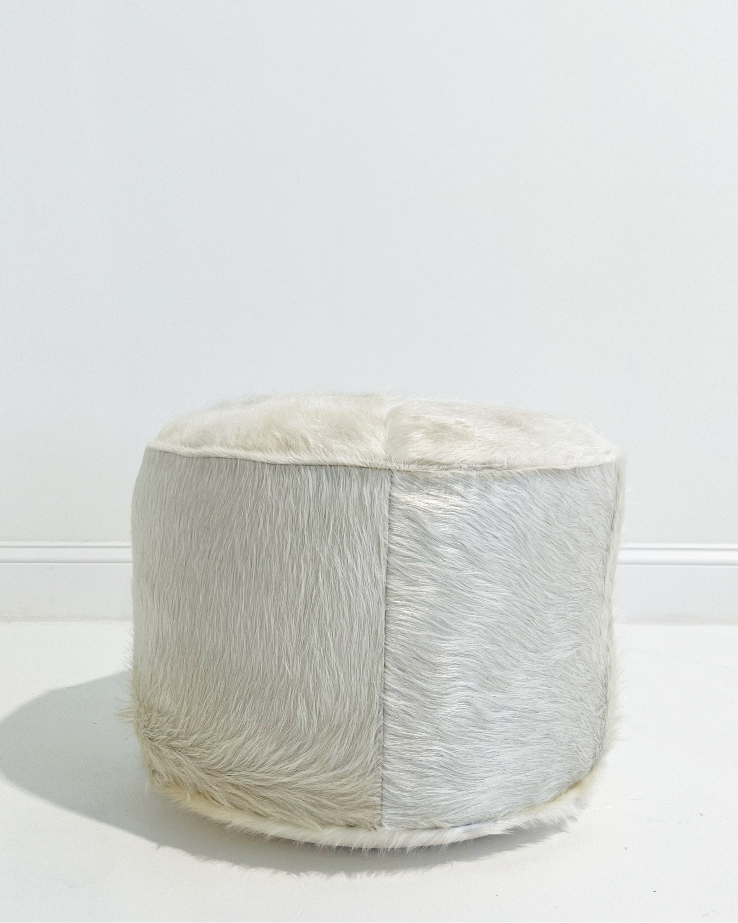 The Forsyth Pouf Ottoman in Ivory Cowhide 03