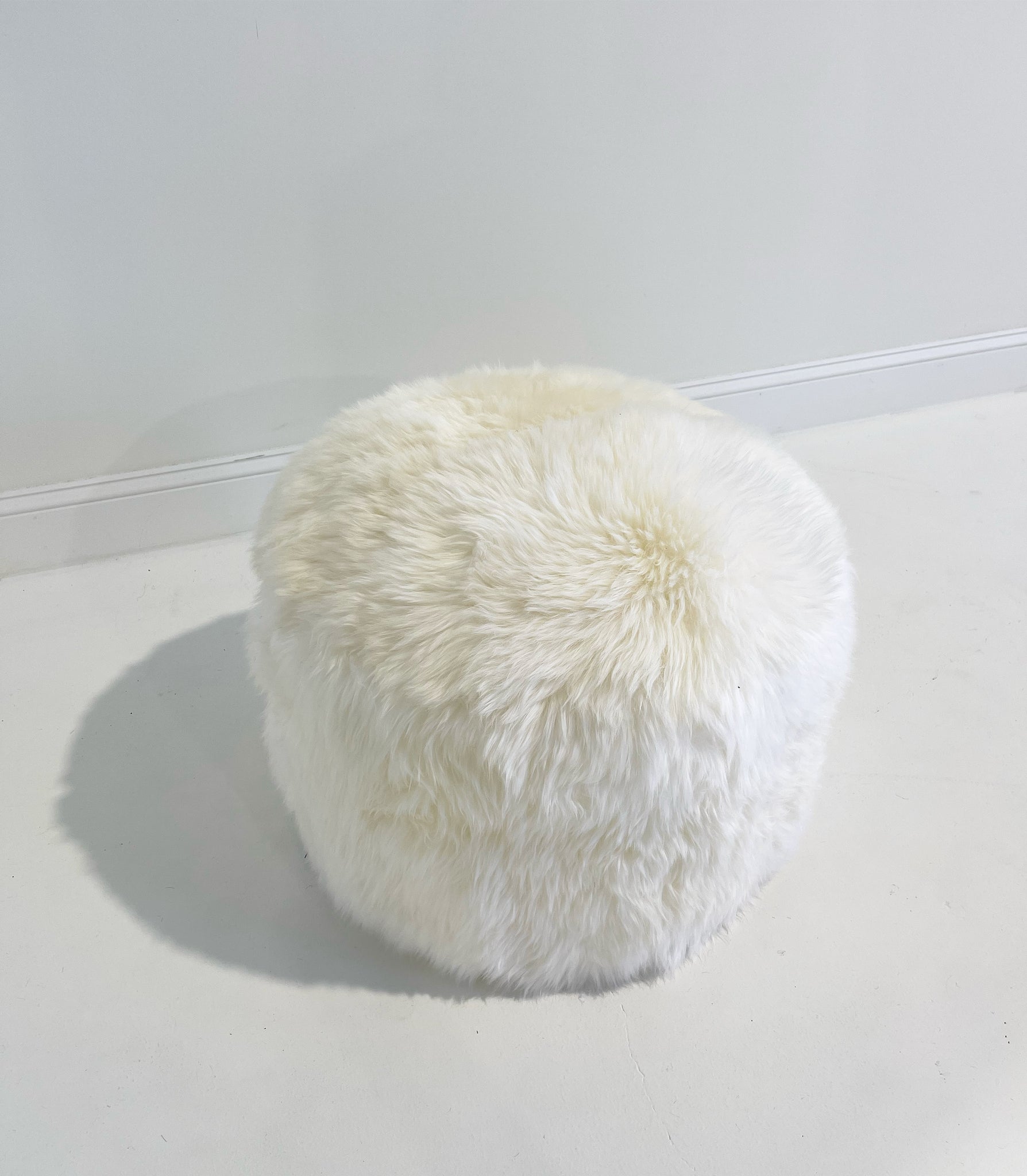 The Forsyth Pouf Ottoman in Sheepskin