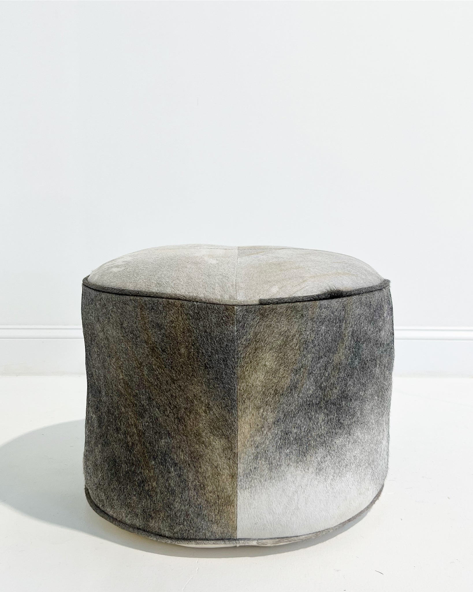 The Forsyth Pouf Ottoman in Salt and Pepper Cowhide 01