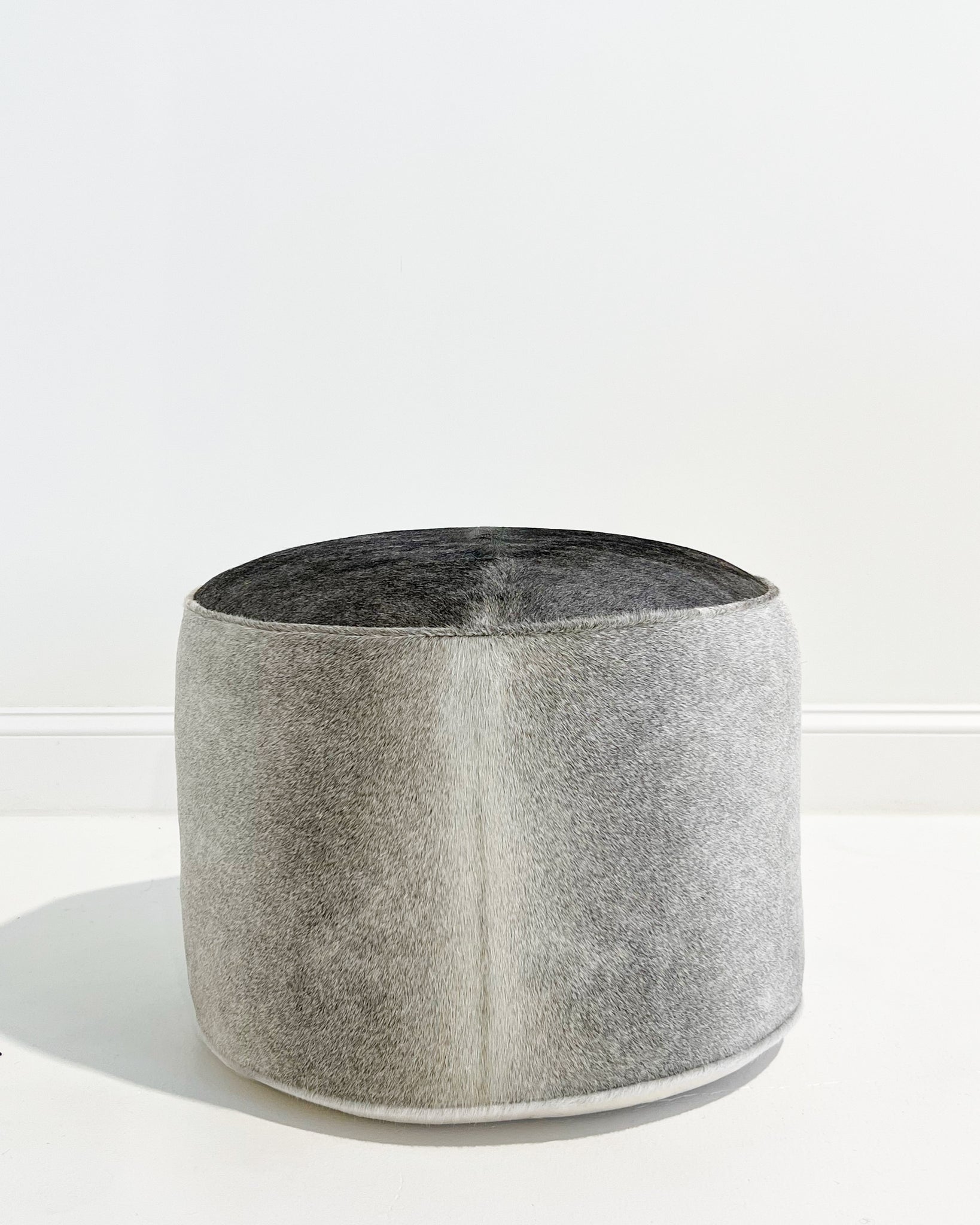 The Forsyth Pouf Ottoman in Salt and Pepper Cowhide 05