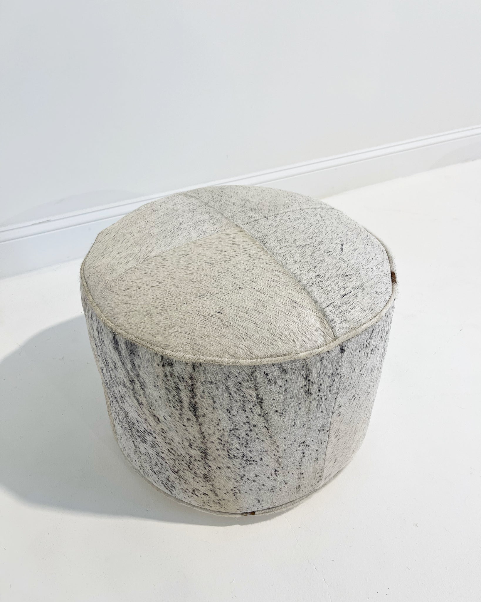 The Forsyth Pouf Ottoman in Speckled Cowhide 01